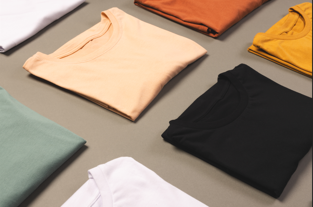 Folded blank t-shirts in multiple colors