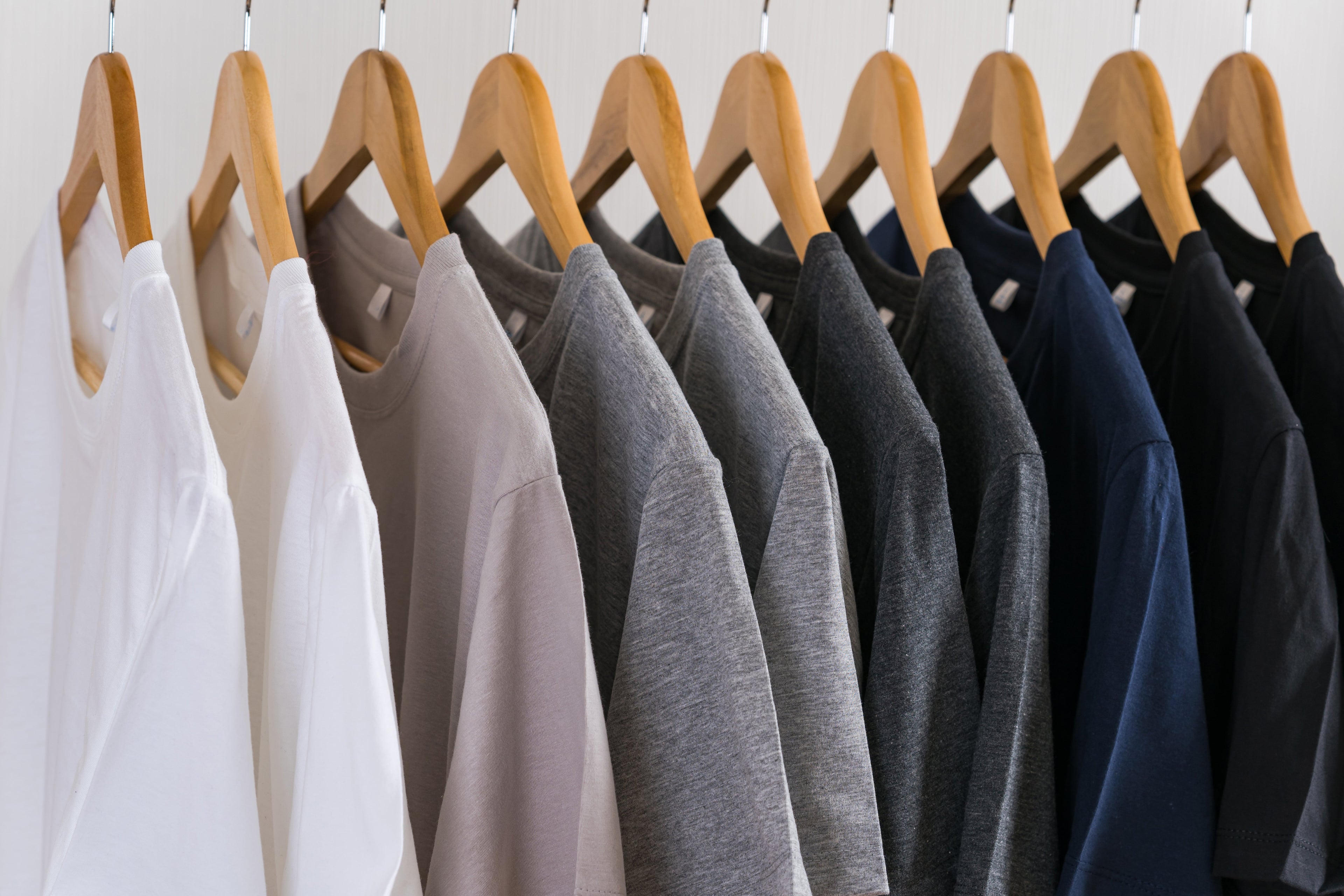 Shirts in multiple colors hanging 