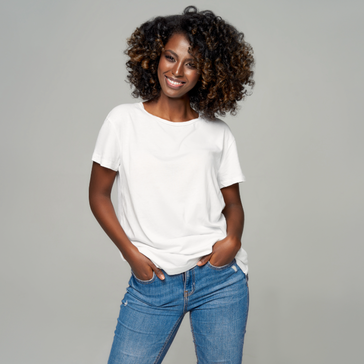 Lady in white top and jeans with white background